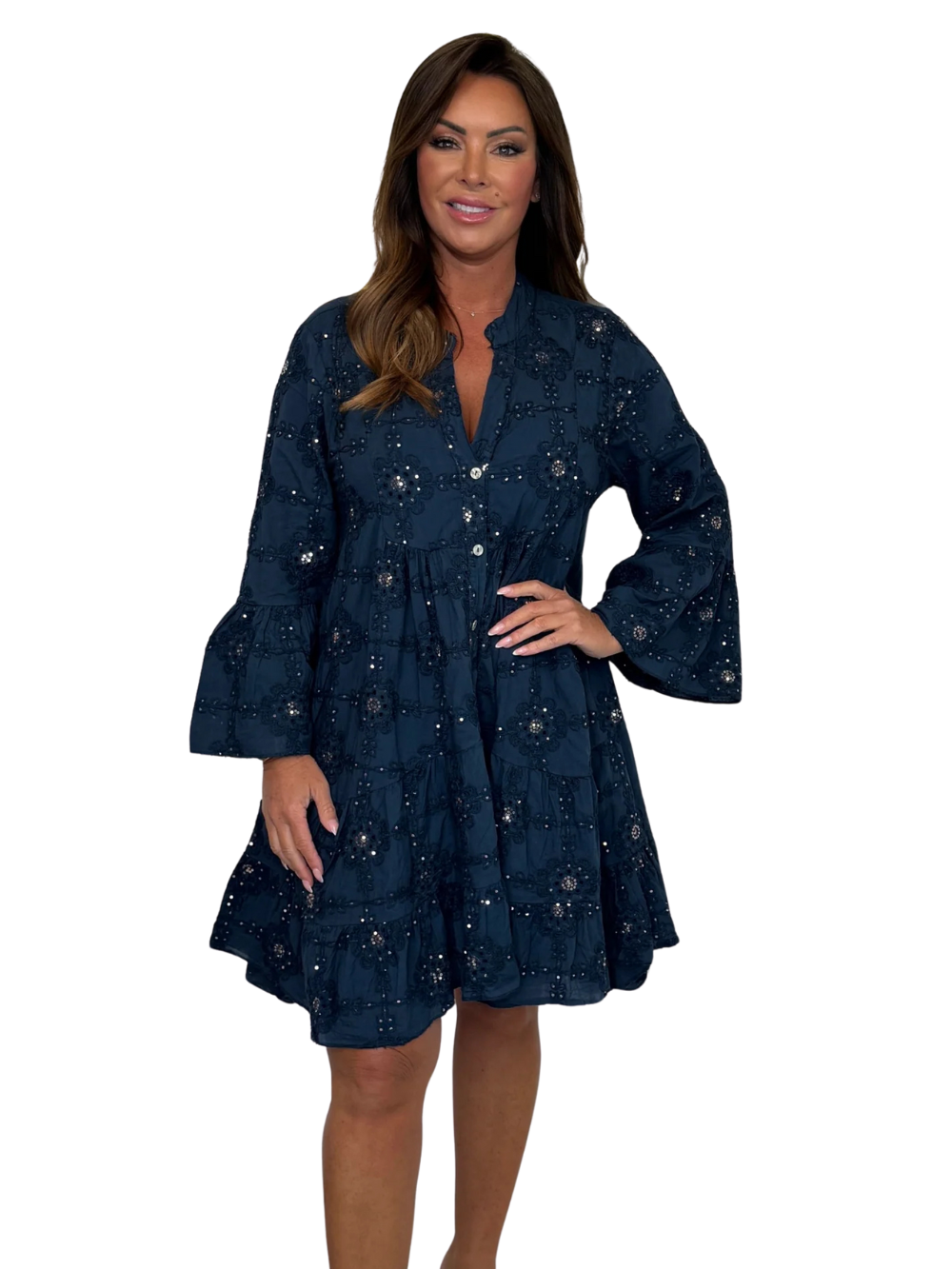 Vestido holgado con detalle de flores y lentejuelas