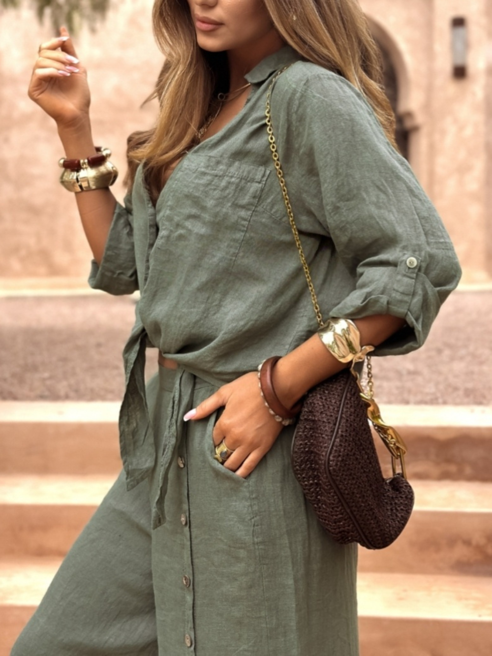 Conjunto de blusa con nudo delantero y pantalón palazzo