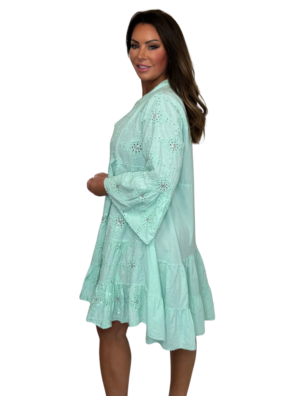 Vestido holgado con detalle de flores y lentejuelas