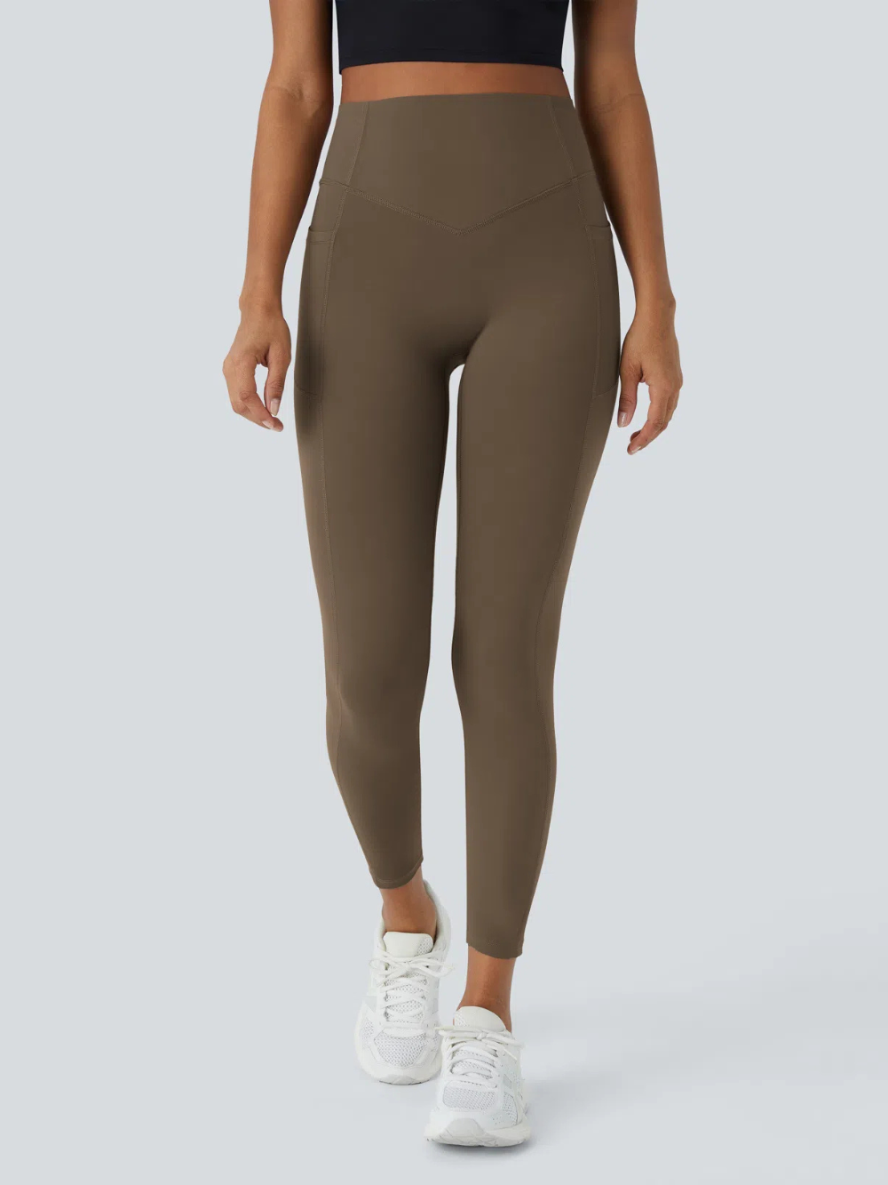 Leggings de tiro alto con bolsillo lateral y efecto moldeador