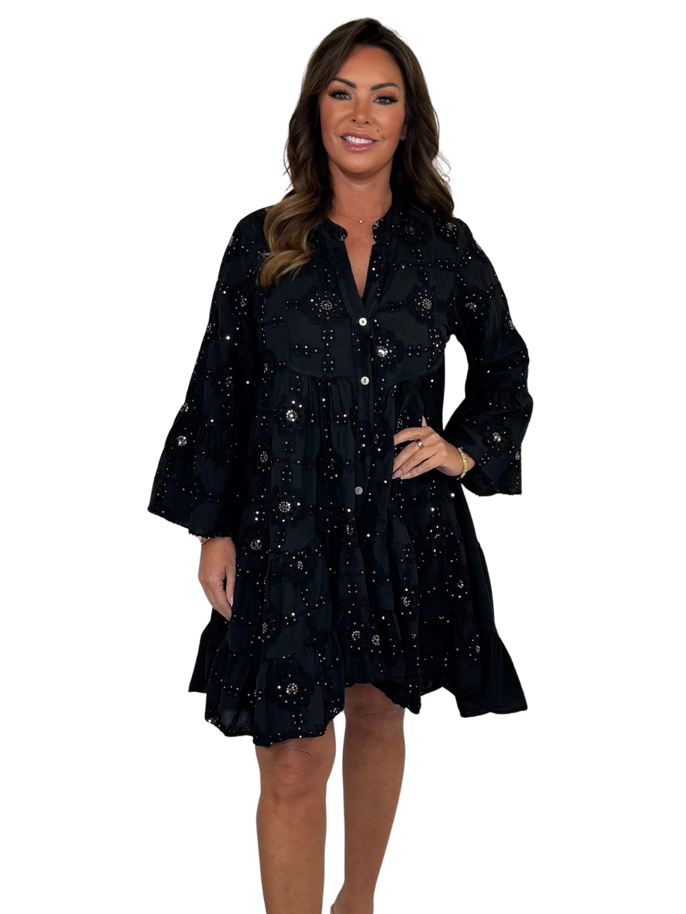 Vestido holgado con detalle de flores y lentejuelas