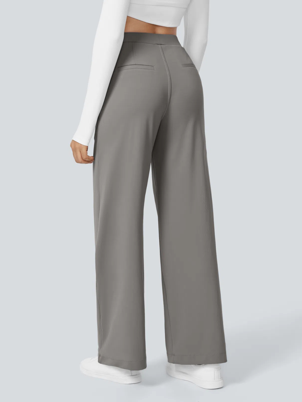 Pantalón recto elástico de tiro alto con pliegues y bolsillos laterales
