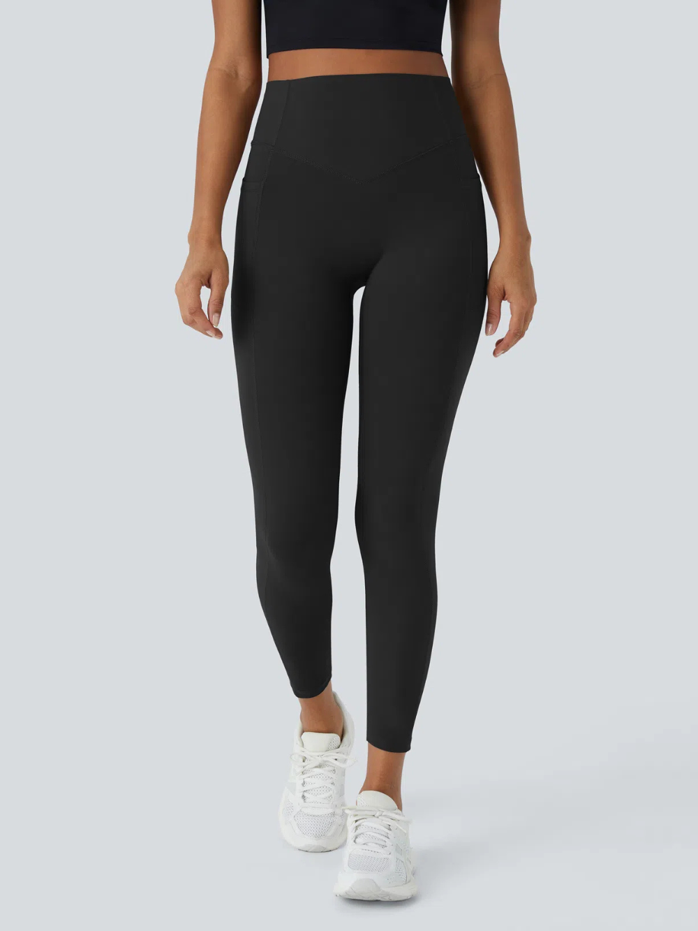 Leggings de tiro alto con bolsillo lateral y efecto moldeador