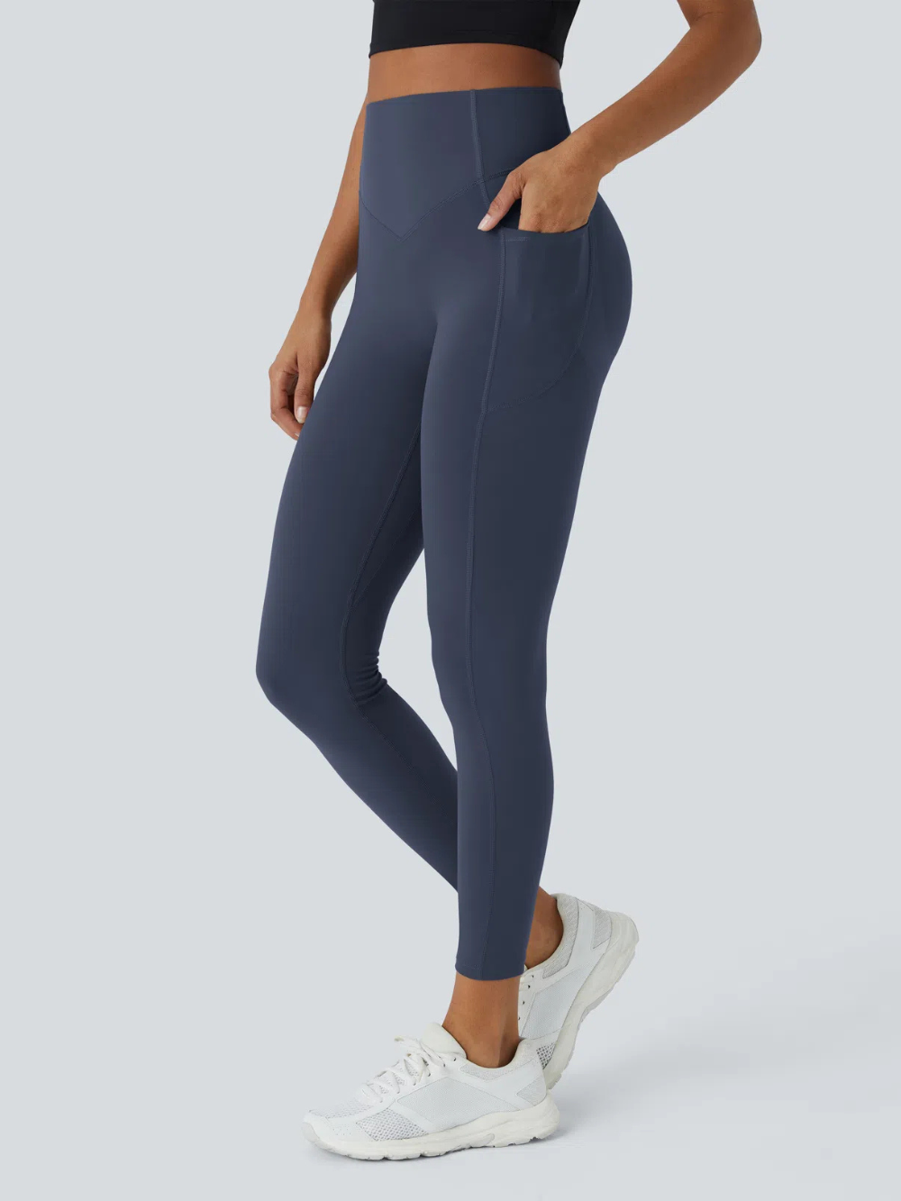 Leggings de tiro alto con bolsillo lateral y efecto moldeador