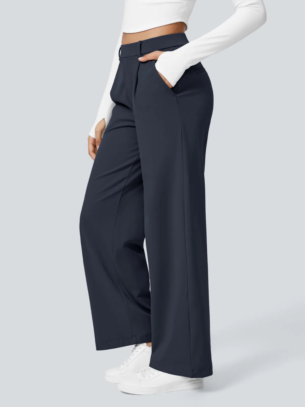Pantalón recto elástico de tiro alto con pliegues y bolsillos laterales
