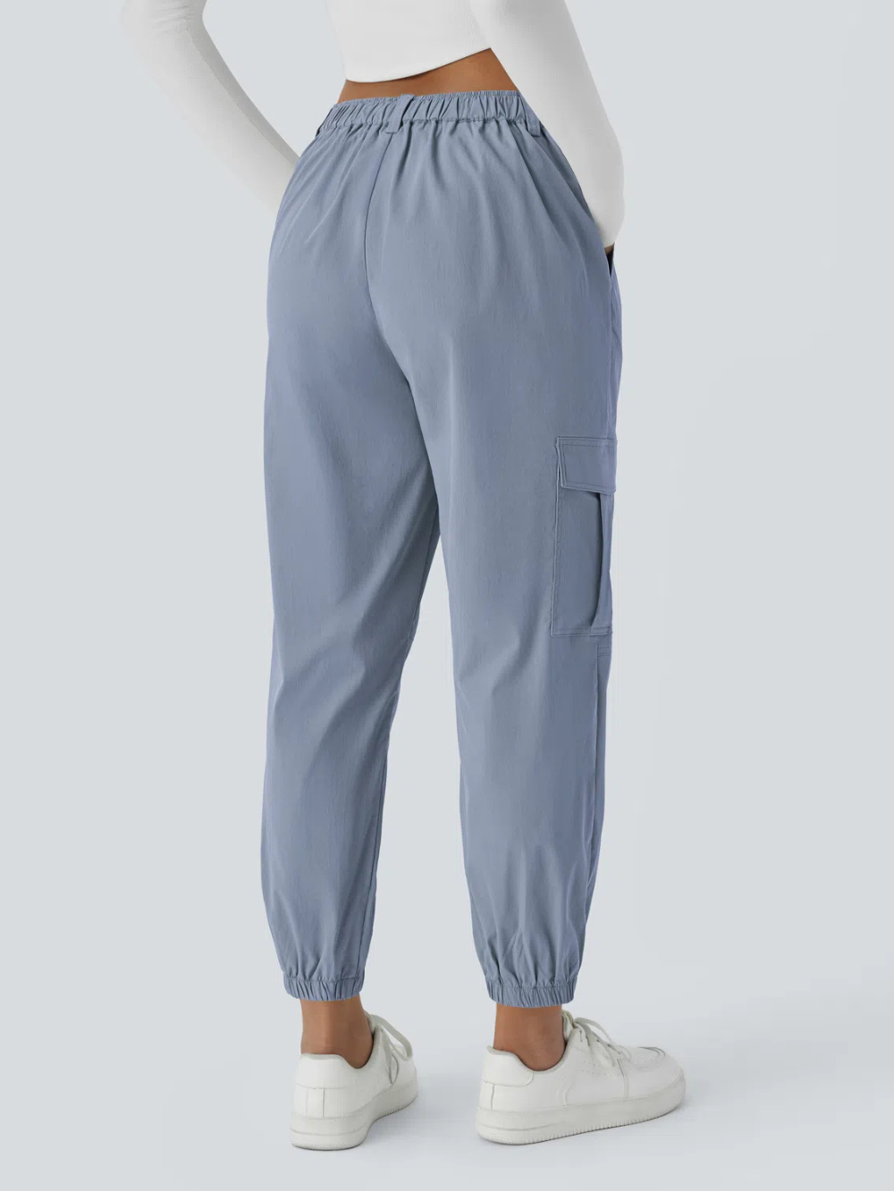 Joggers cargo múltiple bolsillo tiro medio botón cremallera