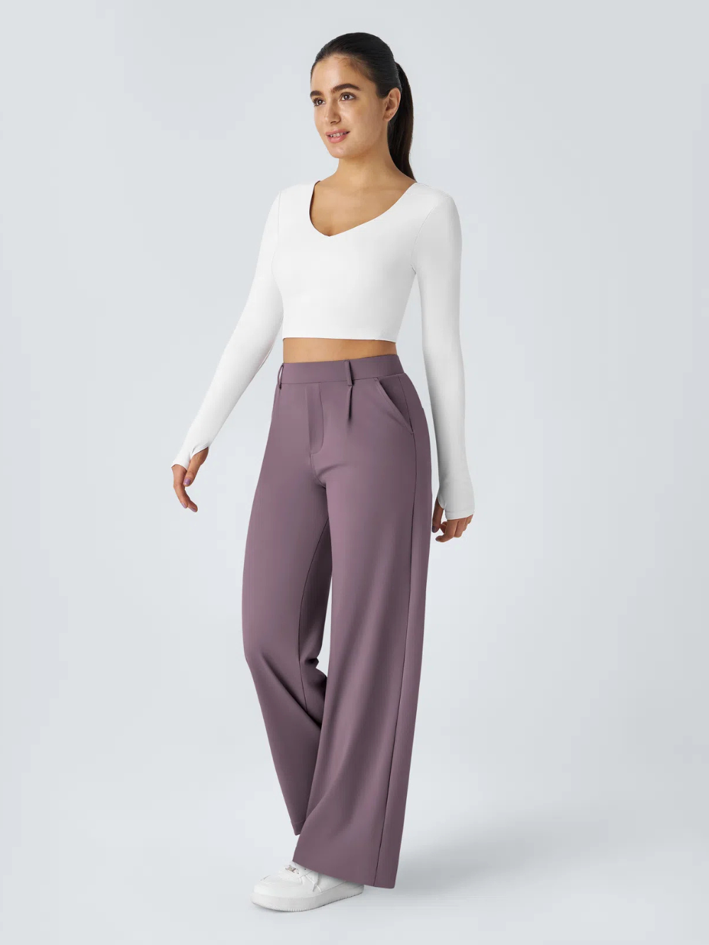 Pantalón recto elástico de tiro alto con pliegues y bolsillos laterales
