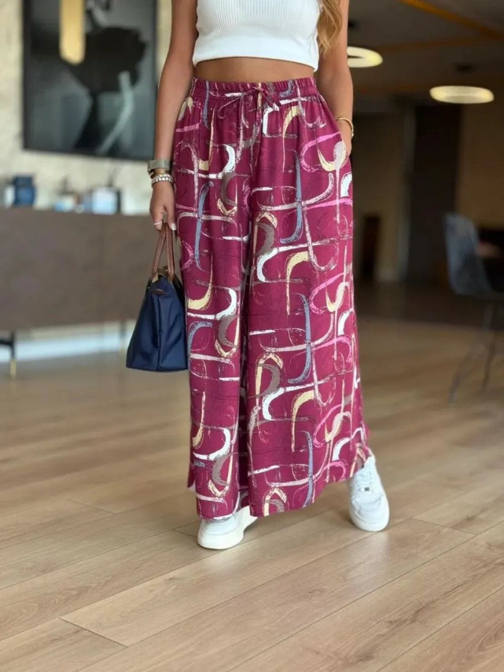 Pantalón palazzo con cintura elástica y estampado