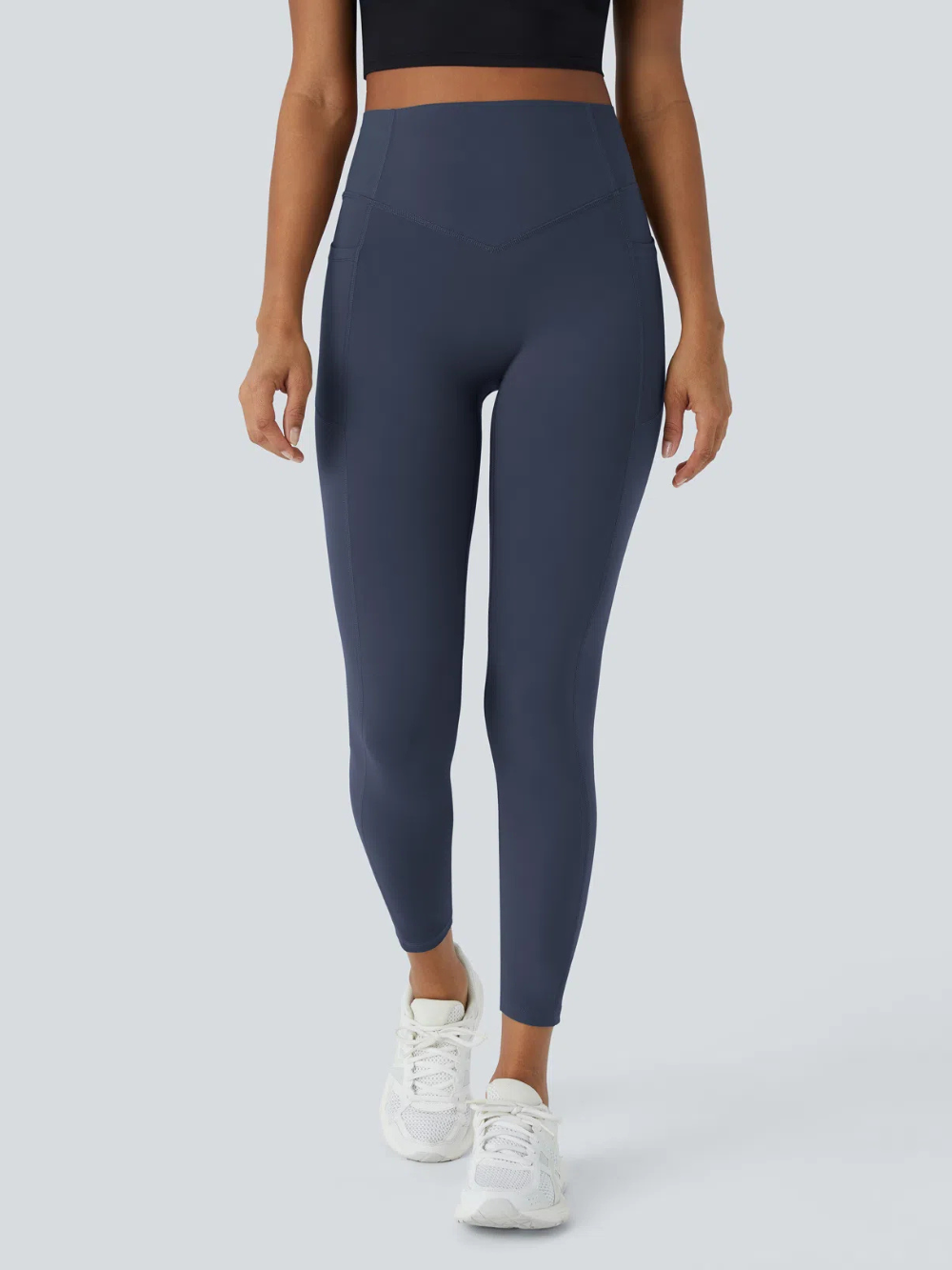 Leggings de tiro alto con bolsillo lateral y efecto moldeador