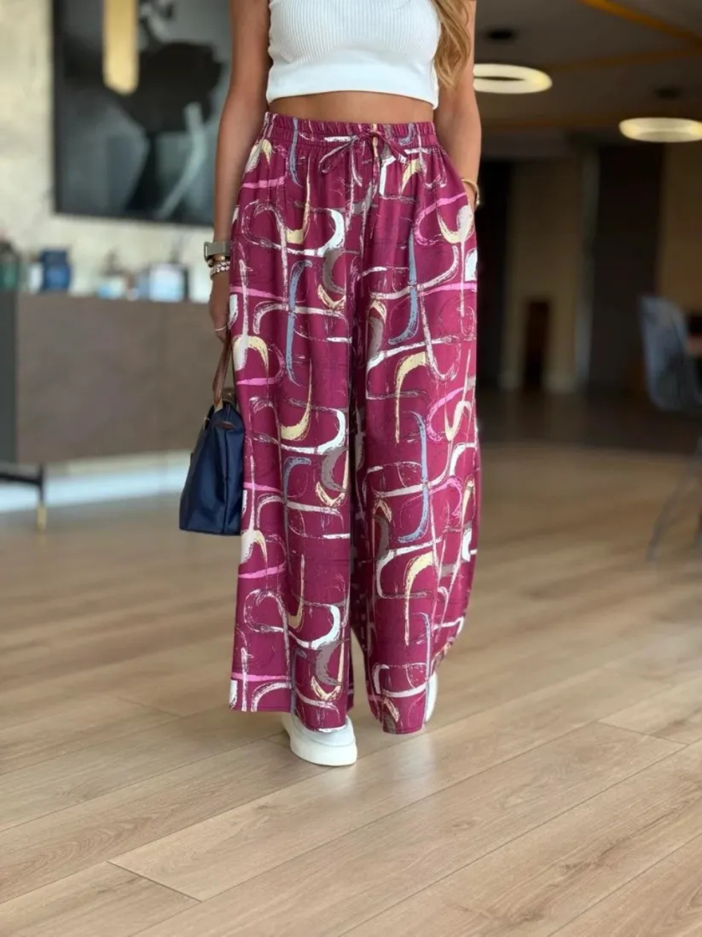 Pantalón palazzo con cintura elástica y estampado