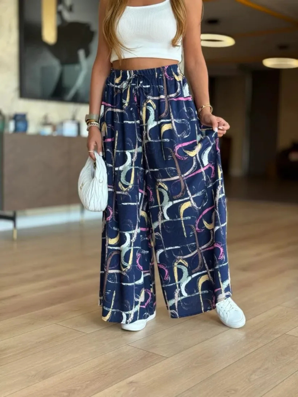 Pantalón palazzo con cintura elástica y estampado