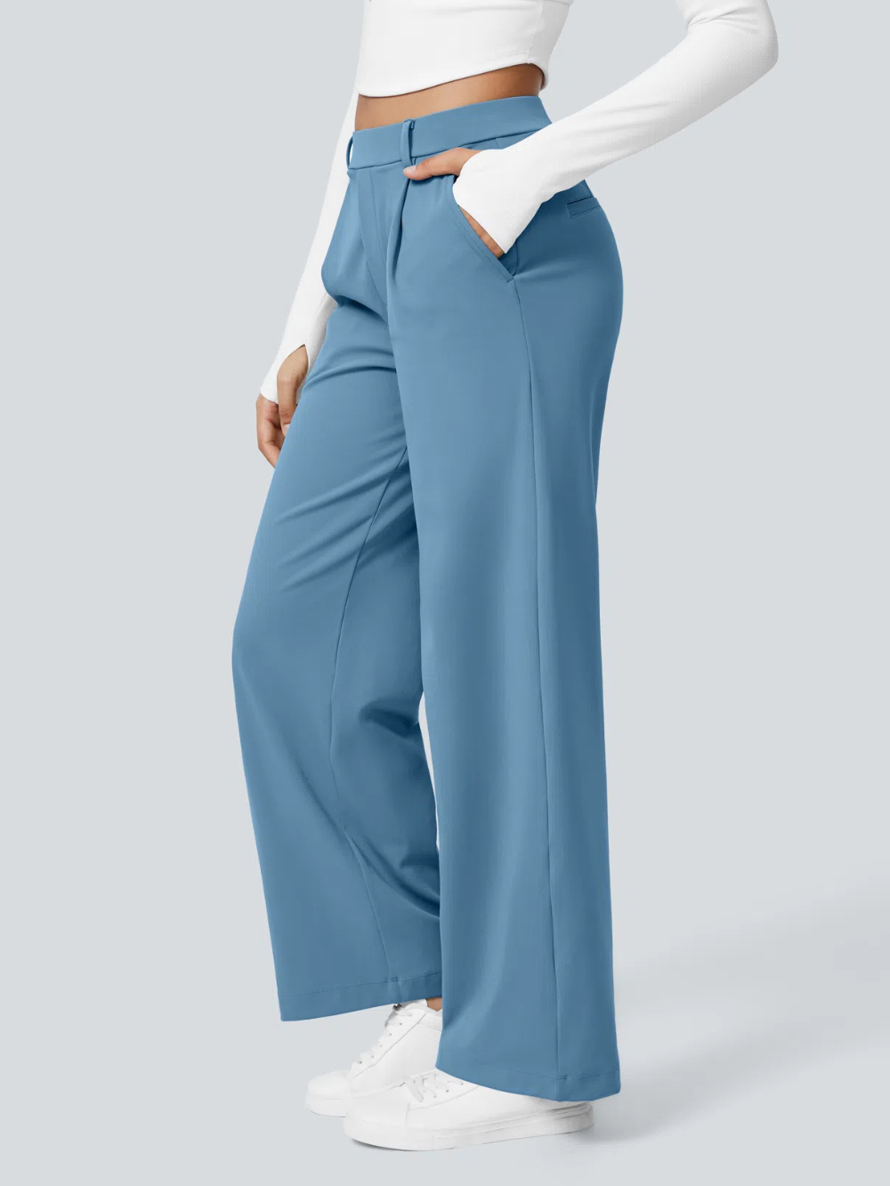 Pantalón recto elástico de tiro alto con pliegues y bolsillos laterales
