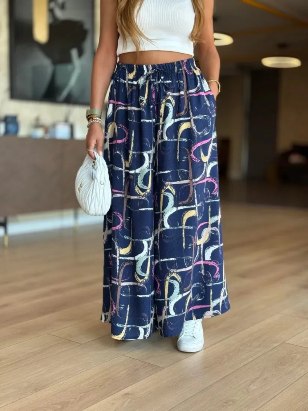 Pantalón palazzo con cintura elástica y estampado
