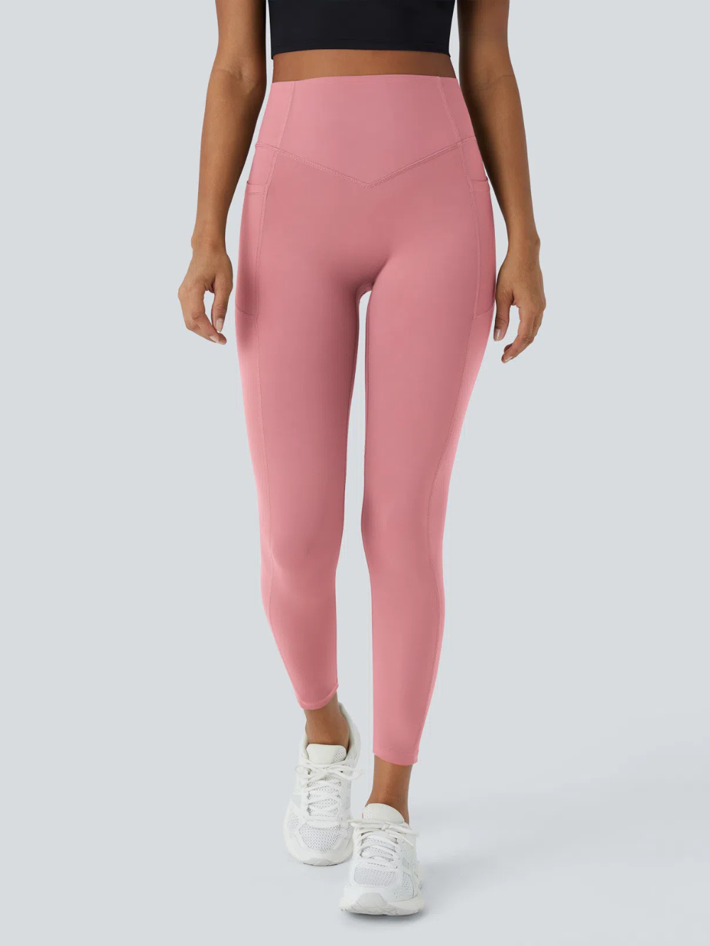 Leggings de tiro alto con bolsillo lateral y efecto moldeador