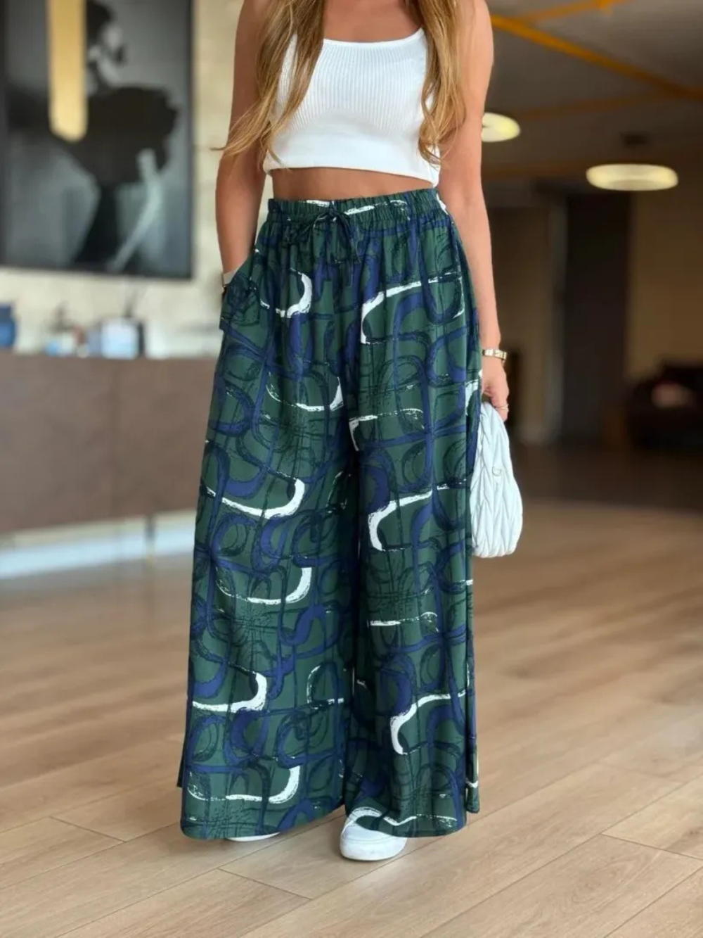 Pantalón palazzo con cintura elástica y estampado