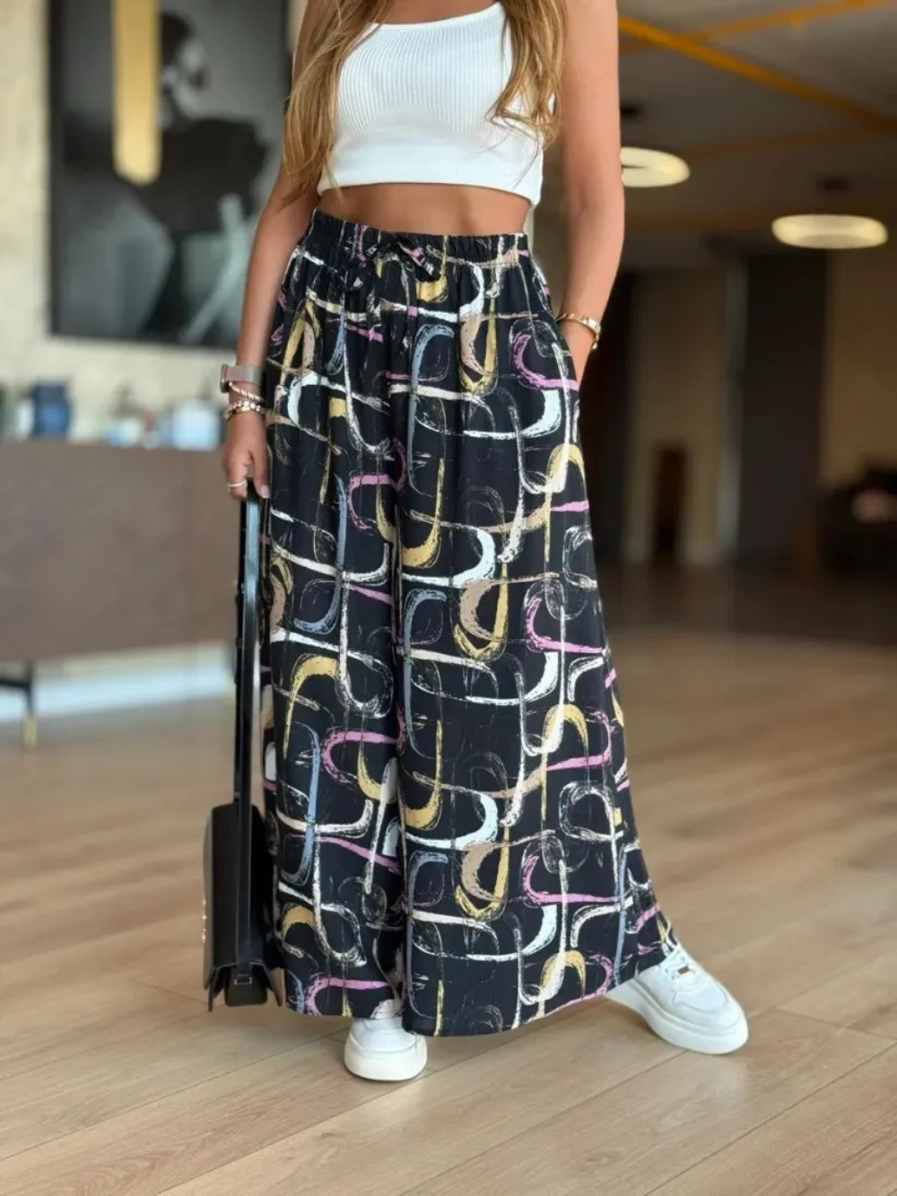 Pantalón palazzo con cintura elástica y estampado