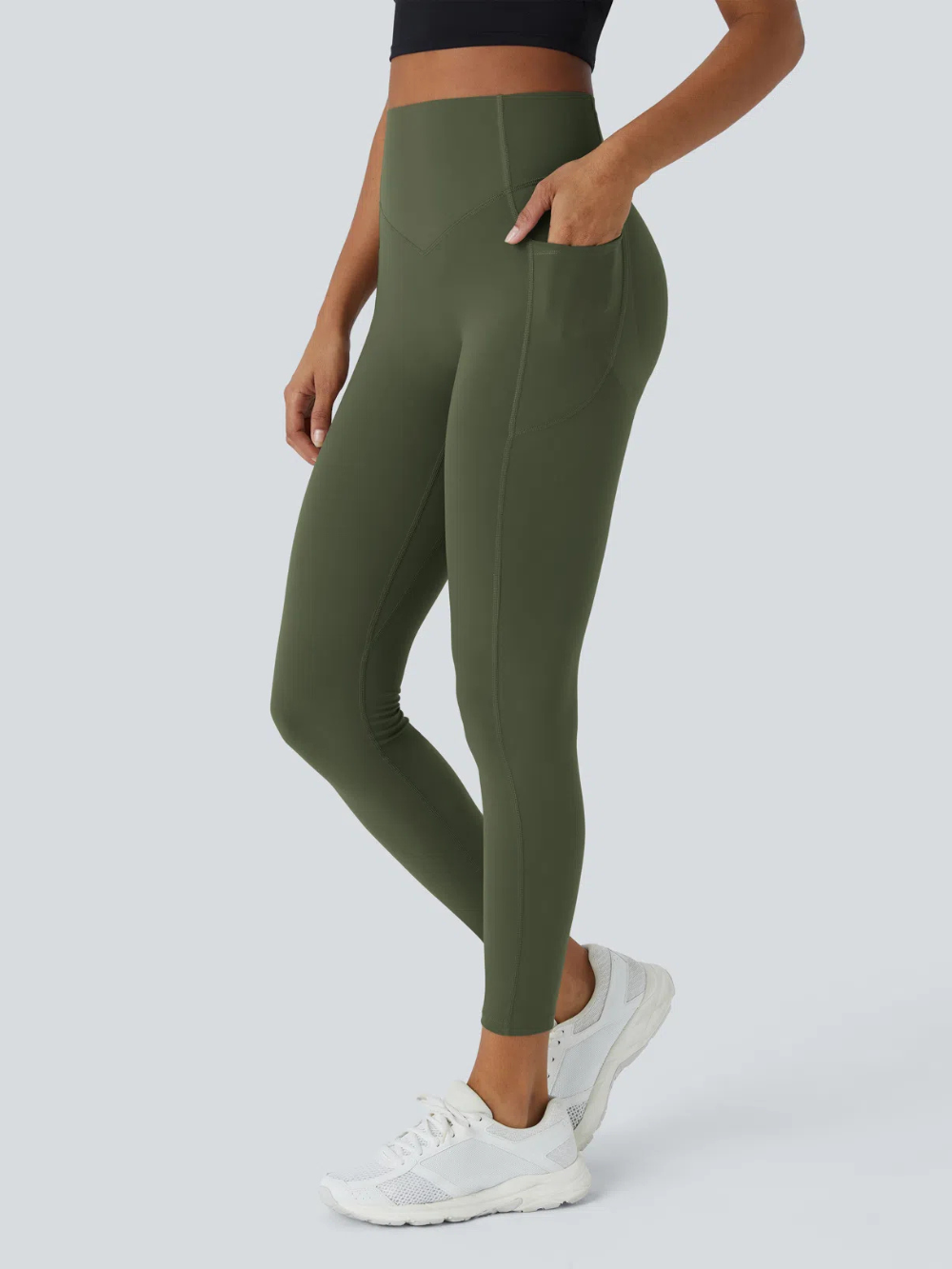 Leggings de tiro alto con bolsillo lateral y efecto moldeador