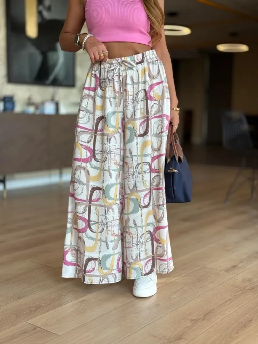Pantalón palazzo con cintura elástica y estampado