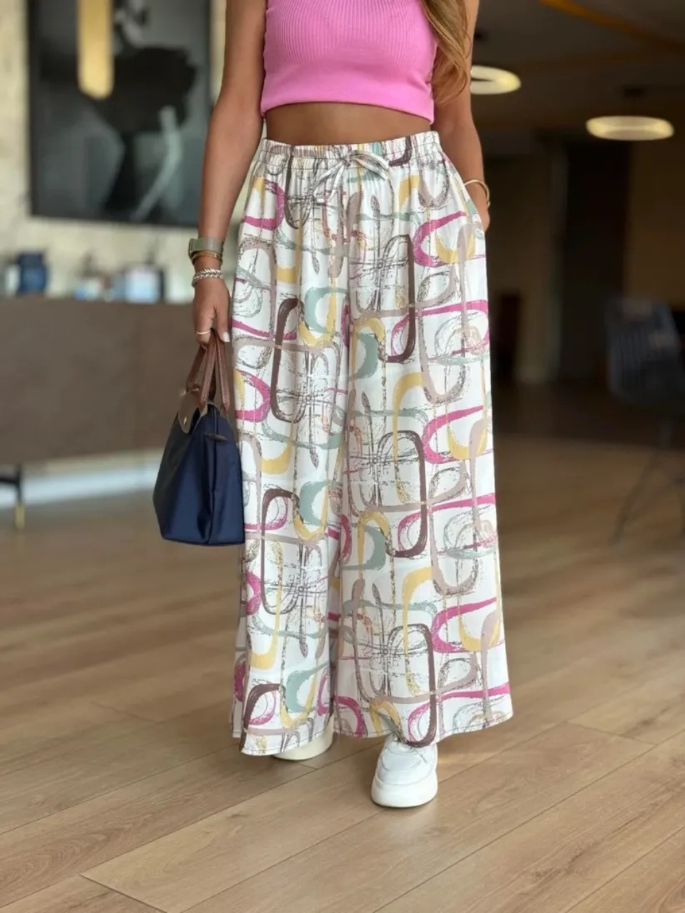 Pantalón palazzo con cintura elástica y estampado