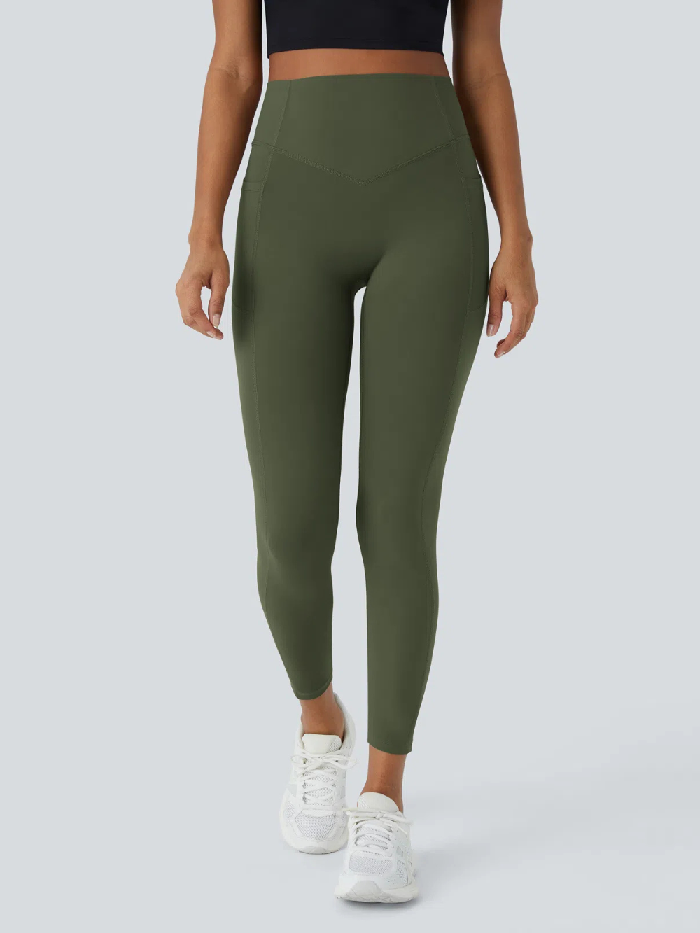 Leggings de tiro alto con bolsillo lateral y efecto moldeador